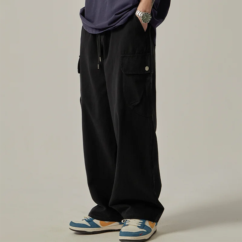 Pantalones cargo para hombre (primavera/otoño 2025): estilo vintage japonés, corte recto y holgado de pernera ancha, con botones, bolsillos grandes y cintura con cordón.