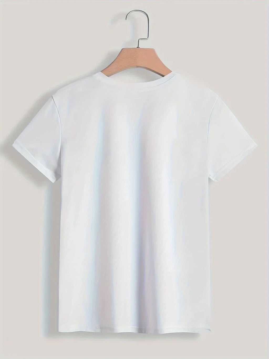 90s style Paris print t-shirt for women and girls; short sleeves, crew neck, casual garment ideal for spring and summer.
