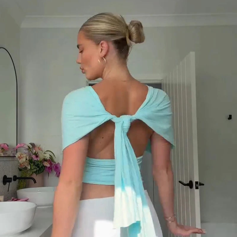 Sexy V-neck cami crop top for women; slim-fit Y2K style, backless, with lace-up and ruched detail. Ideal for parties and clubs. Summer 2026 trend.