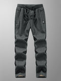 Men's winter sweatpants: thick, warm fleece joggers, casual cotton sportswear with zippered pockets and plus sizes (6XL, 7XL, 8XL).